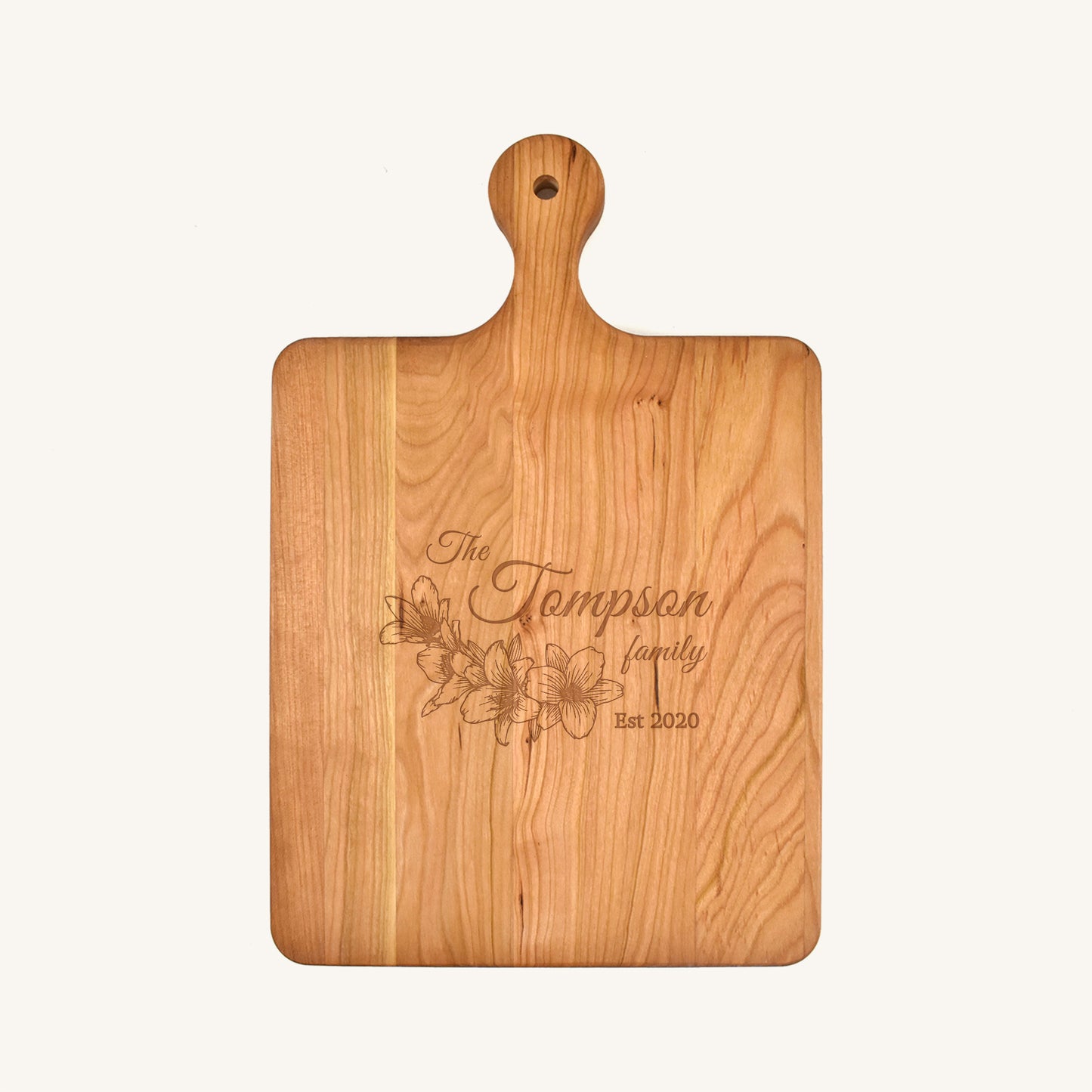 Tabla de cortar de madera con mango redondeado