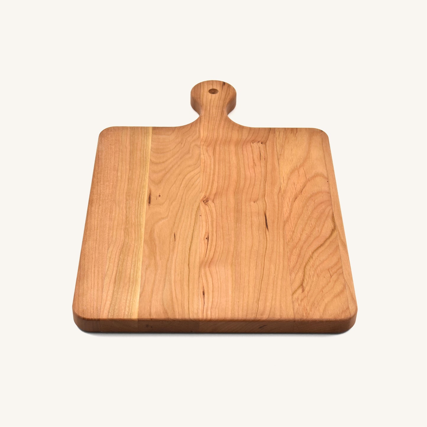 Tabla de cortar de madera con mango redondeado