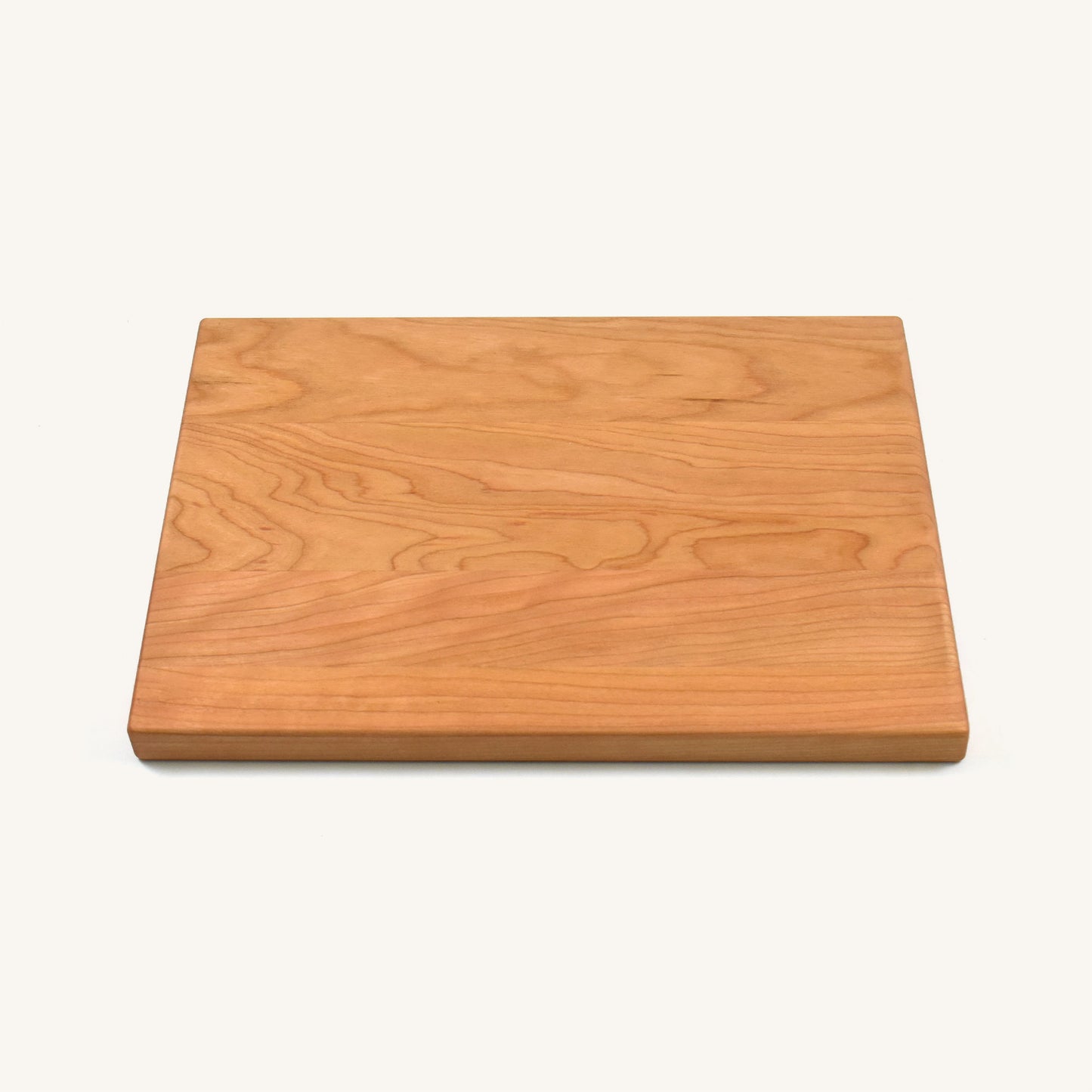 Tabla de cortar de madera con esquinas y bordes redondeados